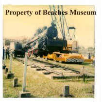 Crane Lifting Locomotive #7, 1982
