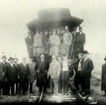 Group of Men and Train