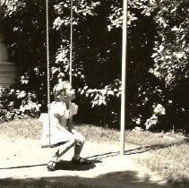 Unidentified Girl on Swing