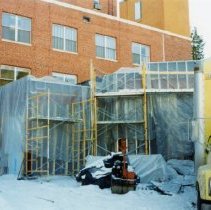 Covered scaffolding during construction