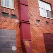 Sheet metal ducts attached to exterior wall of hospital