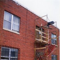 Scaffolding outside wall of hospital building