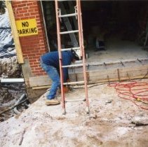 Workman setting concrete forms