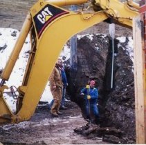 Workman preparing a trench at hospital work site