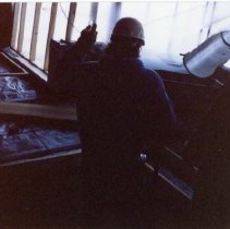 Workman inside construction in progress