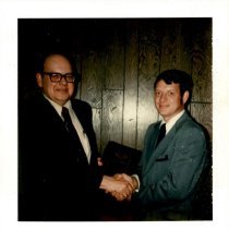 Mr. Tibble presenting award to Don Thrall