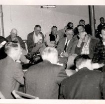 Large group attending a meeting