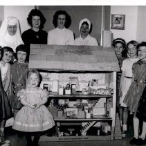 Doll house presented by Pluma Brownie troop #132