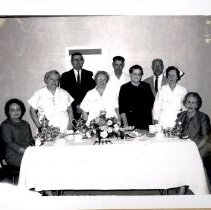 Group posing at a tea event
