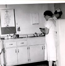 Nurses in utility room