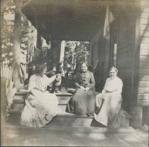 Group on Porch with Dog