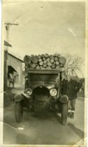 Untitled: Truck Carrying Logs