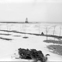 View from shore of the range light on the Kincardine pier in winter.