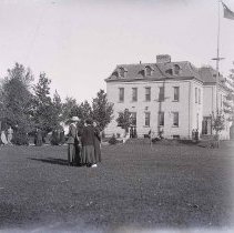 Several women standing outside the Kincardine High School.