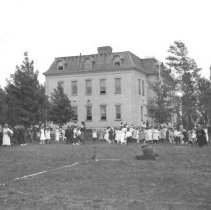Large group of people gathered outside the Kincardine High School.