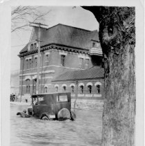 Car in street flood