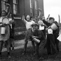 Burgoyne school children with hand in air playing