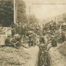 Putting in water works, Chesley, Ont., postcard front