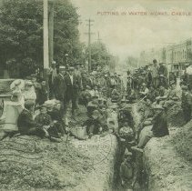 Putting in water works, Chesley, Ont., postcard front
