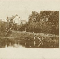 A view showing the Manse, postcard front