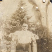 Gil McLaren holding two fish