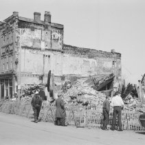 K-71-01-21 - Apr. 7, 1971, demolished fire-damaged stores, Chesley