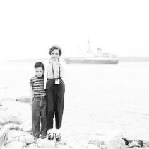 K-60-02-32 Howard and Marilyn McNabb in front of Krug cottage, Tobermory