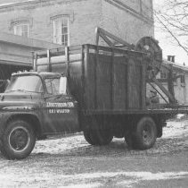 K-66-19-08 Jim Patterson with his truck and stoning machine, Keppel Twp.