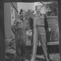 Page 60a - Eldon Schneider and Peter Norman McRorie