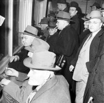 A2013.012.02329 - Spectators behind windows at Port Elgin curling rink