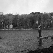 K-62-10-01 East end of Gillies Lake, Howard Krug in foreground, Oct. 1962