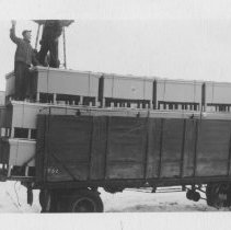 K-64-01-01 Loading office desks at Krug Bros., Chesley. WM Woods (pictured)