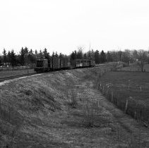 K-68-13-15 C.N.R. freight north bound at north edge of Chesley, April 1968