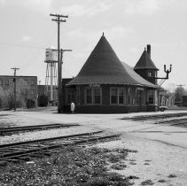 K-69-11-29 C.N.R. Station, Chesley, with dandelions in full bloom, 1969