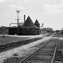 K-69-11-30 C.N.R. Station, Chesley, with dandelions in full bloom, 1969