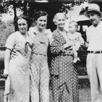 Knowles family in front of the Breakers