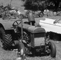 K-74-14-31 Tractor and other machinery in a farm yard, Arran Township, 1974