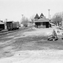 K-75-06-30 C.N.R. Station, Chesley with load of building lumber, 1975