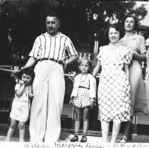 Knowles family members and friends standing in front of the Breakers ca. 19