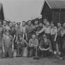 22: Men of the 160th on cleaning detail in camp in England