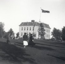 Kincardine High School, with numerous women outside on the grounds.