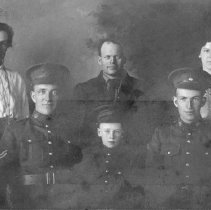 Unidentified family, possibly James Baker seated on the left