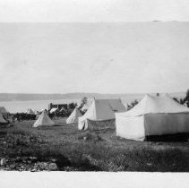 Tent encampment by the water