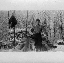 Lumberjack next to saw