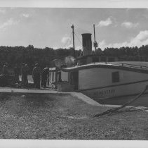 Steamboat loading coal