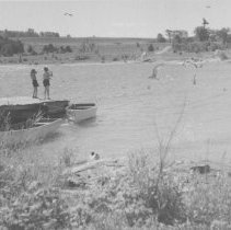 Girls standing on dock