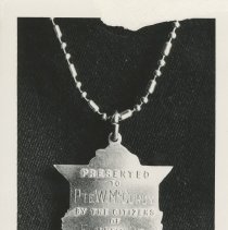Pte. W. McCurdy shield necklace back