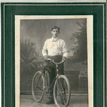 Unidentified man with bicycle