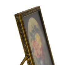 Untitled [Pink and yellow flowers in blue vase]