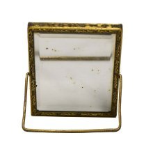 Untitled [Pink and yellow flowers in blue vase]